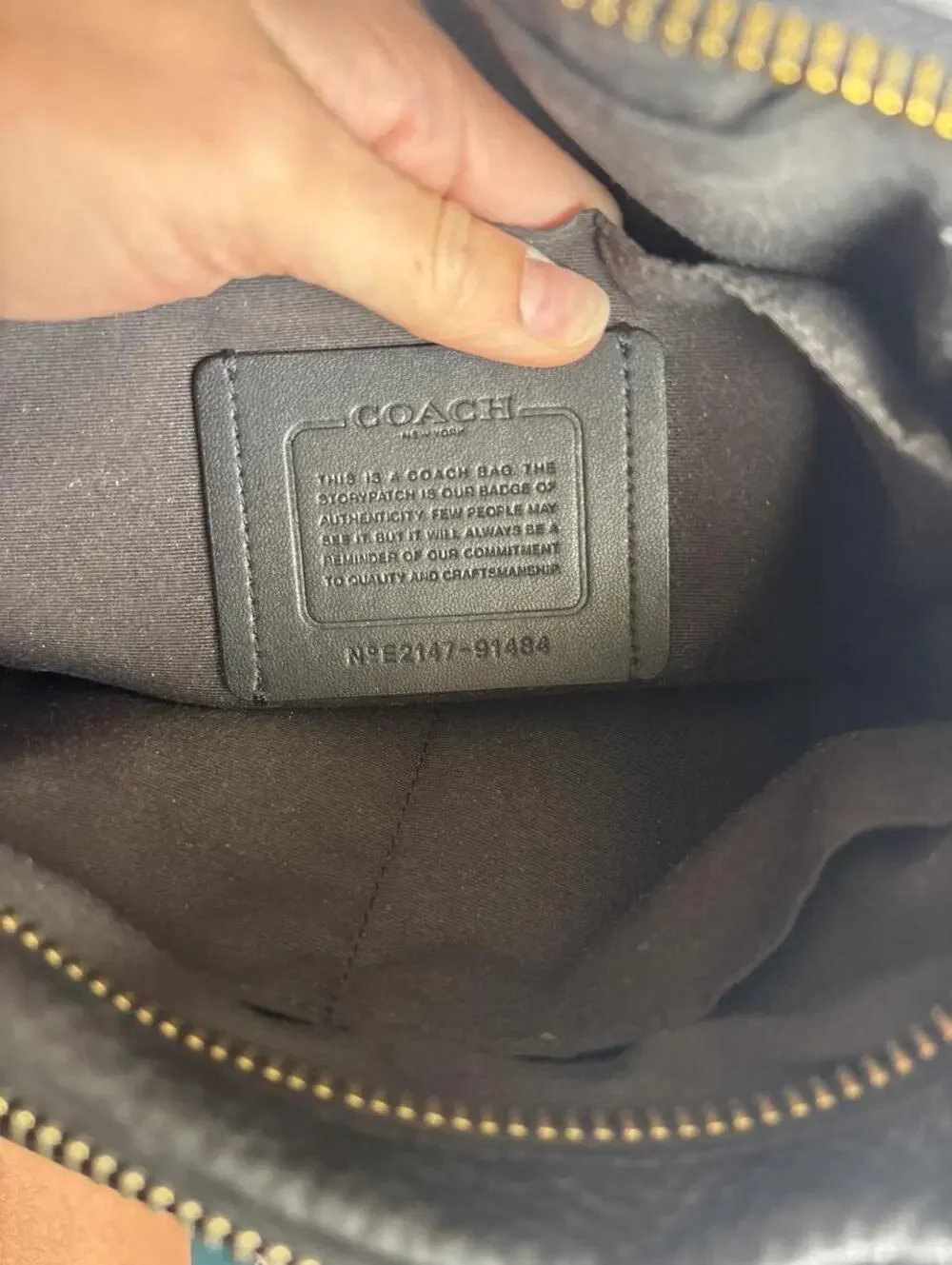 Contact Black pebbled leather crossbody bag